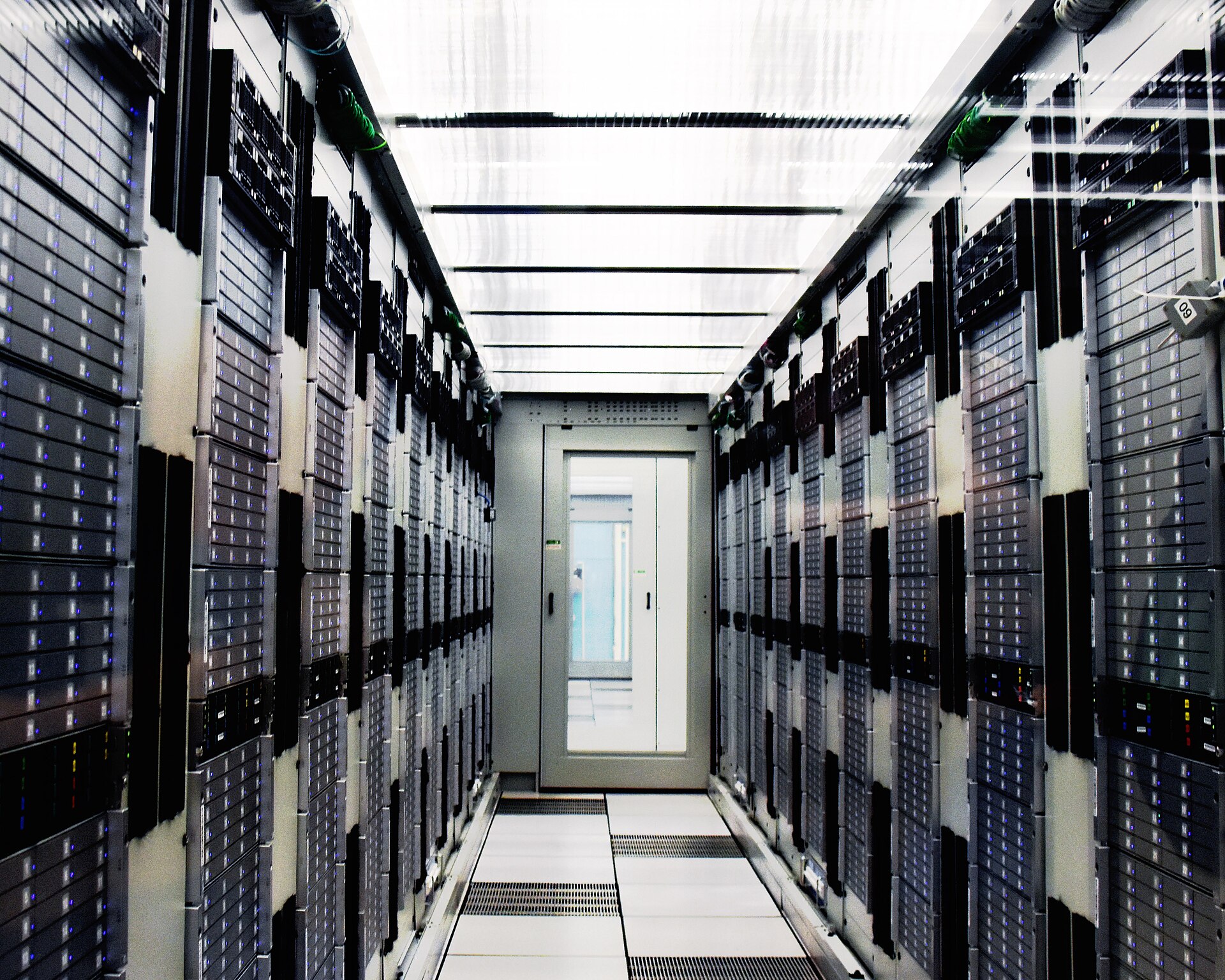 Symmetrical aisle of high-density compute racks inside the CERN Computer Center
